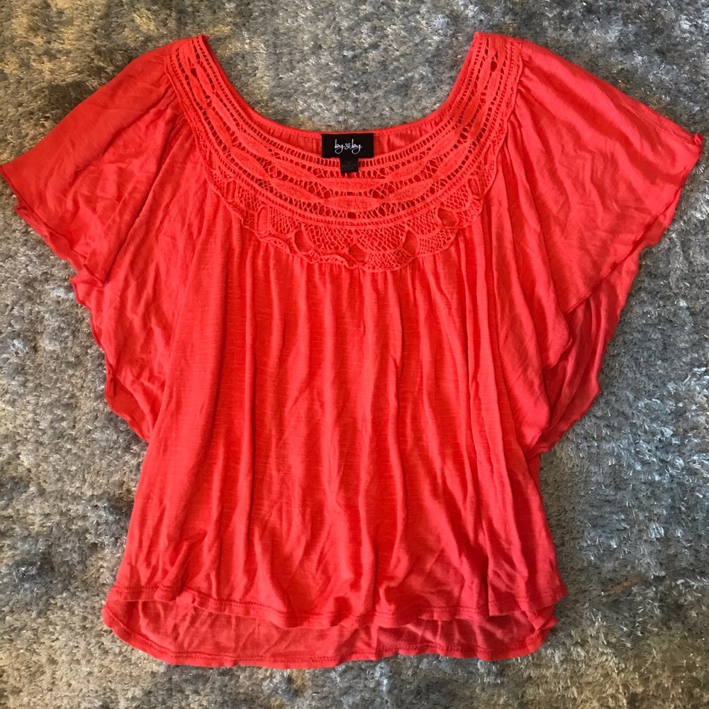 Orange summer shirt.
